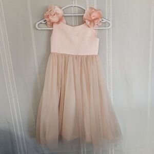 Charming Peach Kids Dress with Floral Details